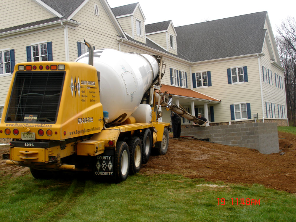 Pouring cement for retaining wall